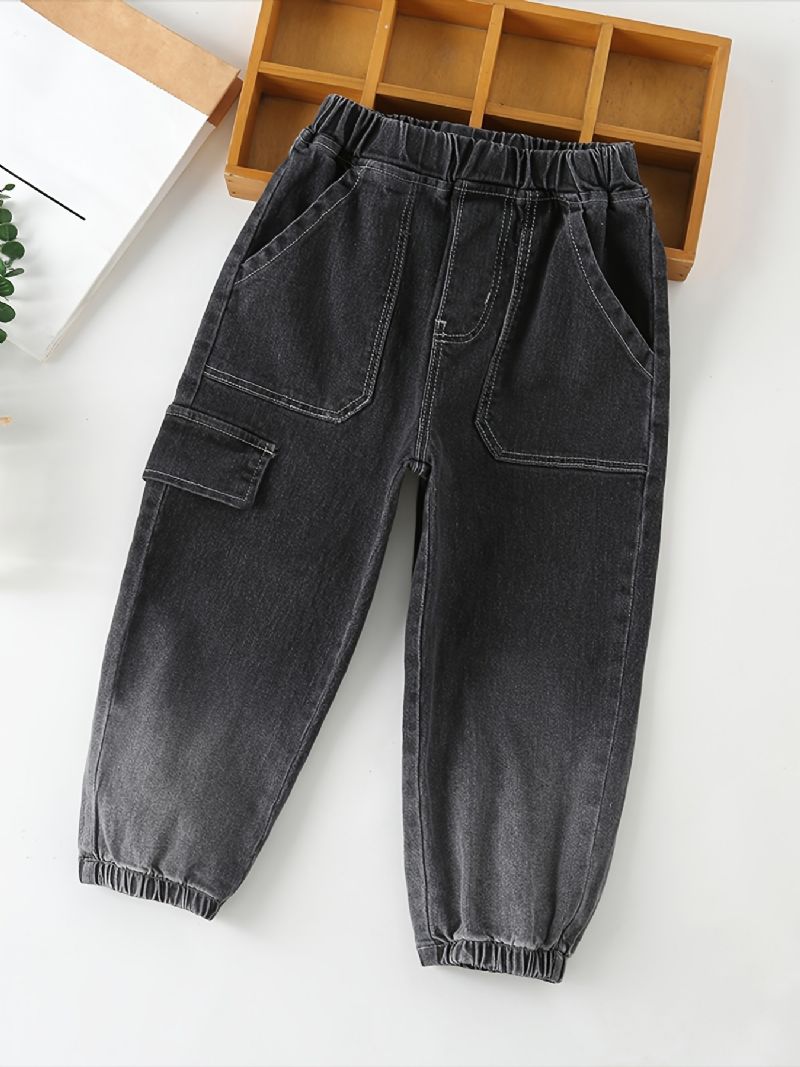 Avsmalnende Jeans For Gutter Med Elastisk Linning Og Lommer